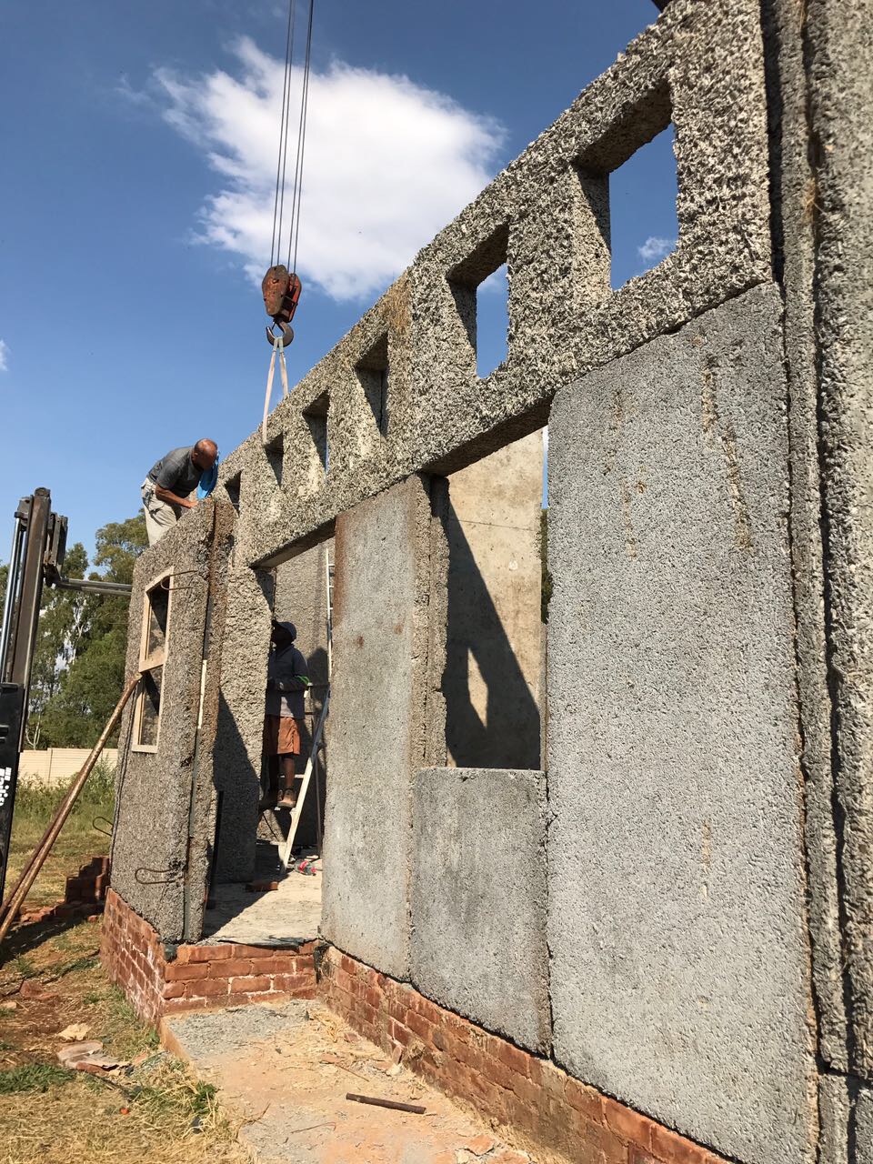 Envirocrete dry jointed wall assembly